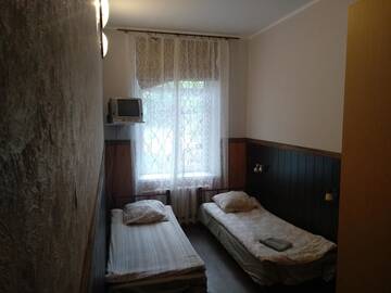Фото номера Бюджетный двухместный номер с 2 отдельными кроватями Отель Atrium г. Рига 4