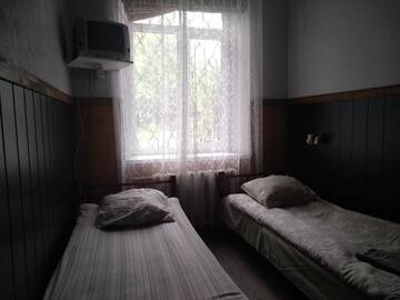 Фото номера Бюджетный двухместный номер с 2 отдельными кроватями Отель Atrium г. Рига 6