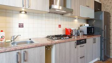 Фото номера Двухуровневые апартаменты Делюкс с 1 спальней Апартаменты Daugava Lux Apartments г. Рига 7