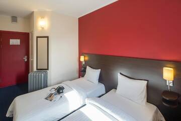 Фото номера Двухместный номер с 2 отдельными кроватями Отель Dodo Hotel г. Рига 4