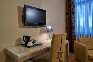 Фото номера Улучшенный двухместный номер с 1 кроватью Отель Opera Hotel г. Рига 13