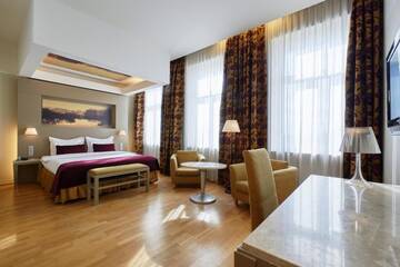 Фото номера Улучшенный двухместный номер с 1 кроватью Отель Opera Hotel г. Рига 17