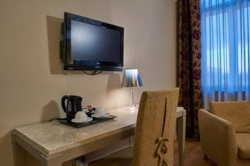 Фото номера Улучшенный двухместный номер с 1 кроватью Отель Opera Hotel г. Рига 7