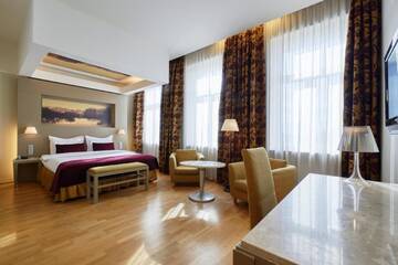Фото номера Улучшенный двухместный номер с 1 кроватью Отель Opera Hotel г. Рига 9