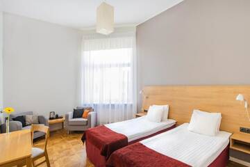 Фото номера Классический двухместный номер с 2 отдельными кроватями Отель Hotel Valdemars Riga managed by Accor г. Рига 3