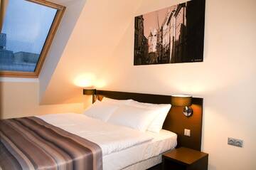 Фото номера Семейный люкс Отель Old City Boutique Hotel г. Рига 4