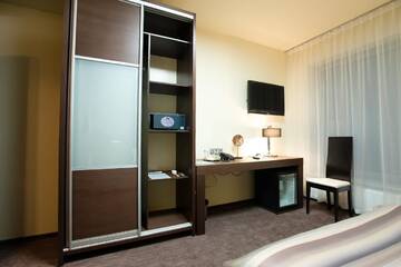 Фото номера Улучшенный двухместный номер с 2 отдельными кроватями Отель Old City Boutique Hotel г. Рига 3