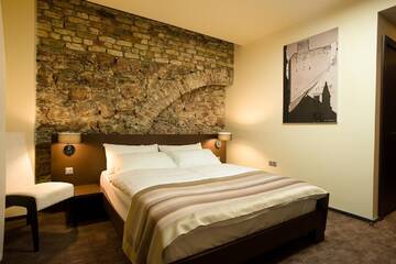 Фото номера Улучшенный двухместный номер с 1 кроватью Отель Old City Boutique Hotel г. Рига 4