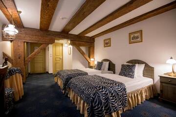 Фото номера Улучшенный двухместный номер с 2 отдельными кроватями Отель Hotel Gutenbergs г. Рига 2