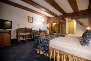 Фото номера Улучшенный двухместный номер с 2 отдельными кроватями Отель Hotel Gutenbergs г. Рига 3