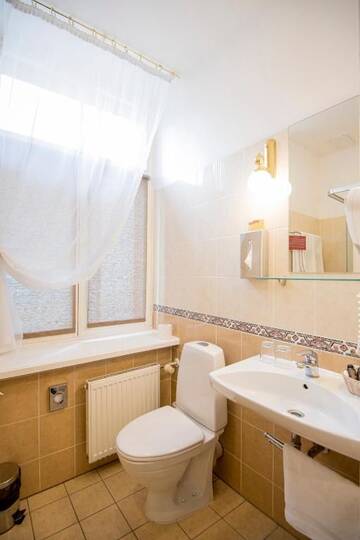 Фото номера Стандартный двухместный номер с 1 кроватью Отель Hotel Gutenbergs г. Рига 6