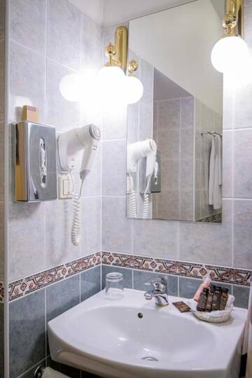 Фото номера Стандартный одноместный номер Отель Hotel Gutenbergs г. Рига 7