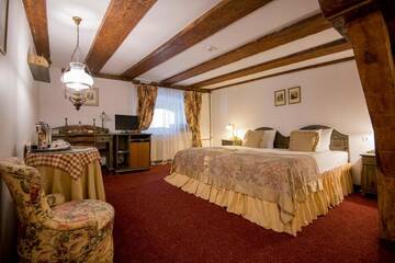 Фото номера Улучшенный двухместный номер с 1 кроватью Отель Hotel Gutenbergs г. Рига 2