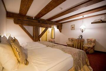 Фото номера Улучшенный двухместный номер с 1 кроватью Отель Hotel Gutenbergs г. Рига 4