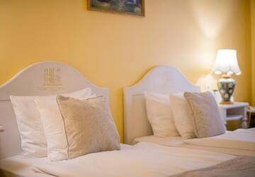 Фото номера Стандартный двухместный номер с 2 отдельными кроватями Отель Hotel Gutenbergs г. Рига 4