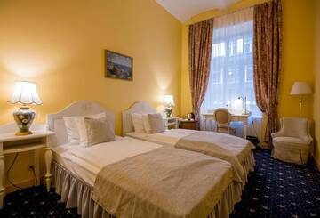Фото номера Стандартный двухместный номер с 2 отдельными кроватями Отель Hotel Gutenbergs г. Рига 2