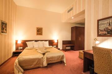 Фото номера Двухместный номер с 2 отдельными кроватями Отель Monika Centrum Hotels г. Рига 7