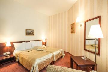 Фото номера Двухместный номер с 2 отдельными кроватями Отель Monika Centrum Hotels г. Рига 6