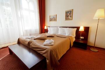 Фото номера Двухместный номер с 2 отдельными кроватями Отель Monika Centrum Hotels г. Рига 8