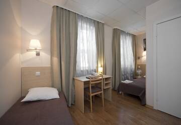 Фото номера Двухместный номер с 2 отдельными кроватями Отель Hotel BEST with FREE PARKING г. Рига 2