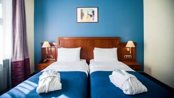 Фото номера Улучшенный двухместный номер с 2 отдельными кроватями Отель Hestia Riga Hotel Jugend г. Рига 2