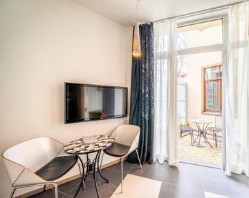 Фото номера Дизайнерский одноместный номер с террасой Отель Rixwell Terrace Design Hotel with FREE Parking г. Рига 2