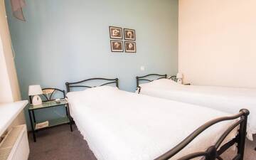 Фото номера Двухместный номер с 2 отдельными кроватями Апарт-отели Hotel Kert г. Рига 2