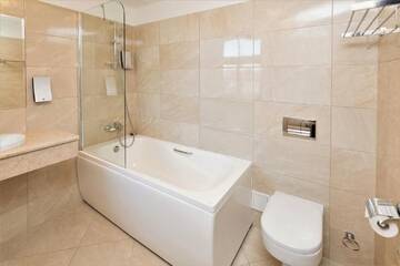 Фото номера Семейный номер (для 2 взрослых и 2 детей) Отель Rixwell Gertrude Hotel г. Рига 5