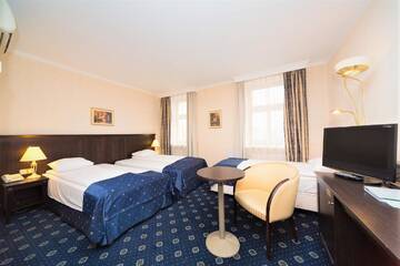 Фото номера Стандартный трехместный номер Отель Rixwell Gertrude Hotel г. Рига 2