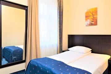 Фото номера Стандартный одноместный номер Отель Rixwell Gertrude Hotel г. Рига 3