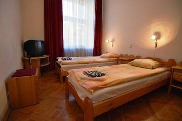 Фото номера Двухместный номер с 2 отдельными кроватями Отель Hotel Multilux г. Рига 5
