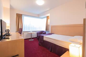 Фото номера Стандартный одноместный номер, доступ в тренажерный зал Отель Riga Islande Hotel with FREE Parking г. Рига 3