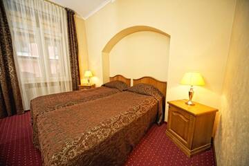 Фото номера Двухместный номер с 2 отдельными кроватями Отель Boutique Hotel Monte Kristo г. Рига 3