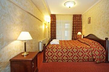 Фото номера Стандартный двухместный номер с 1 кроватью Отель Boutique Hotel Monte Kristo г. Рига 5