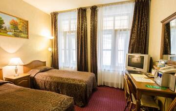 Фото номера Двухместный номер с 2 отдельными кроватями Отель Boutique Hotel Monte Kristo г. Рига 2