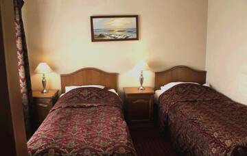 Фото номера Двухместный номер эконом-класса с 2 отдельными кроватями Отель Boutique Hotel Monte Kristo г. Рига 4