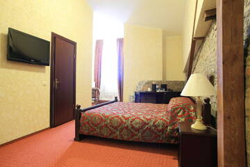 Фото номера Полулюкс с гидромассажной ванной Отель Boutique Hotel Monte Kristo г. Рига 4