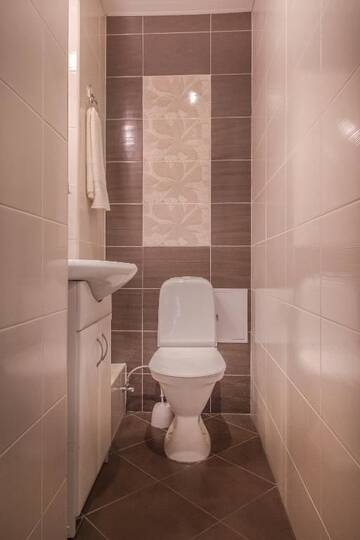 Фото номера Апартаменты с 2 спальнями Апартаменты ANNA Riga Apartment г. Рига 43