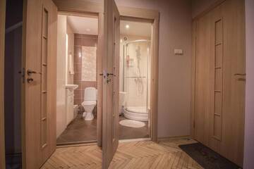 Фото номера Апартаменты с 2 спальнями Апартаменты ANNA Riga Apartment г. Рига 44