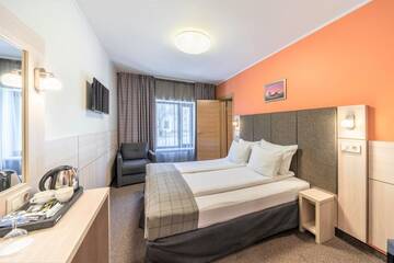 Фото номера Семейный номер Отель Wellton Riga Hotel &amp; SPA г. Рига 2