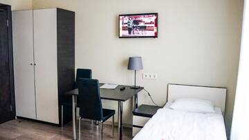 Фото номера Четырехместный номер с 4 односпальными кроватями Отель Bella Riga Hotel г. Рига 13