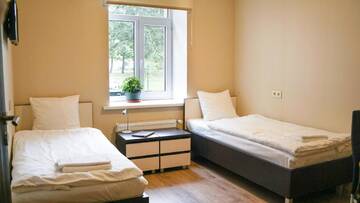 Фото номера Трехместный номер с тремя односпальными кроватями Отель Bella Riga Hotel г. Рига 12