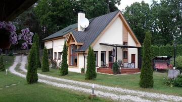 Фото номера Дом с 3 спальнями Дома для отпуска Forest Edge Lodge and House г. Рига 20