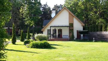 Фото номера Дом с 3 спальнями Дома для отпуска Forest Edge Lodge and House г. Рига 21