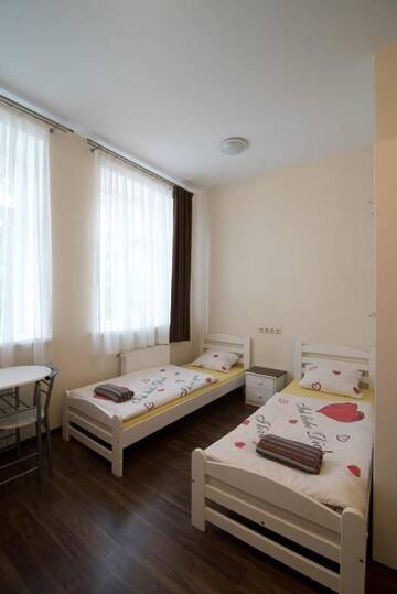 Фото номера Четырехместный номер с душем Отель Happy Hotel г. Рига 4