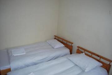 Фото номера Двухместный номер с 2 отдельными кроватями Гостевой дом Ļeņina apartamenti г. Рига 5