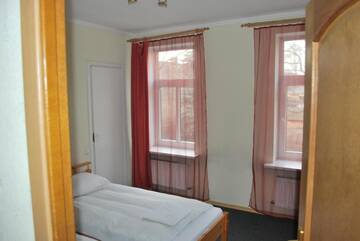 Фото номера Двухместный номер с 2 отдельными кроватями Гостевой дом Ļeņina apartamenti г. Рига 6