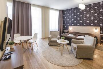 Фото номера Апартаменты-студио с балконом Апартаменты Riga Lux Apartments - Ernesta, Free parking г. Рига 14