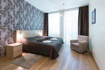 Фото номера Уютные апартаменты с 1 спальней и балконом Апартаменты Riga Lux Apartments - Ernesta, Free parking г. Рига 11