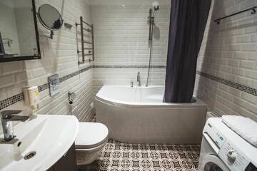 Фото номера Апартаменты с 2 спальнями и балконом Апартаменты Riga Lux Apartments - Ernesta, Free parking г. Рига 18